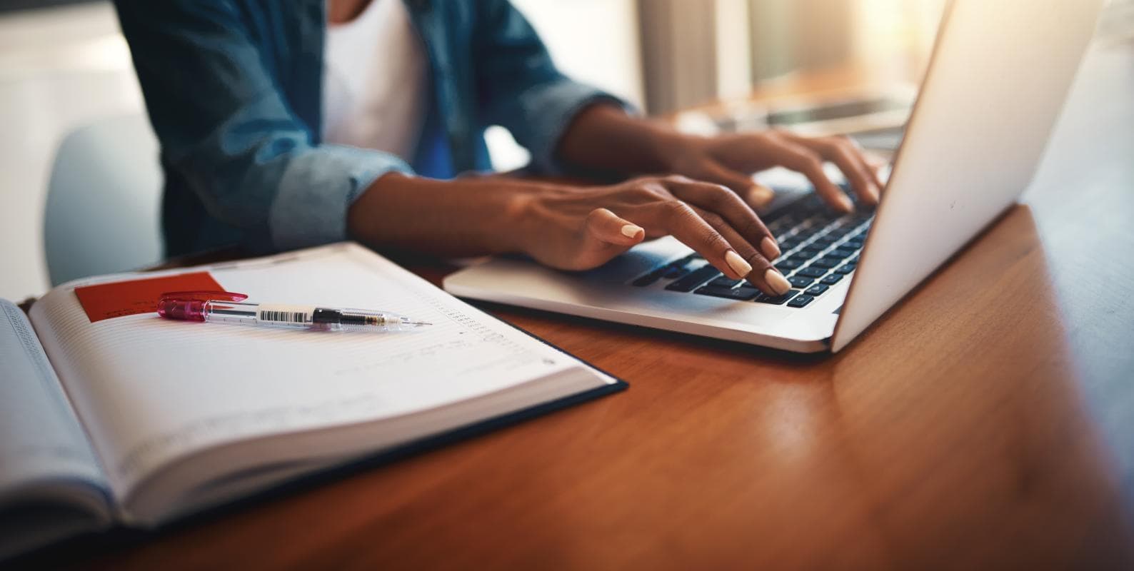Woman using laptop.