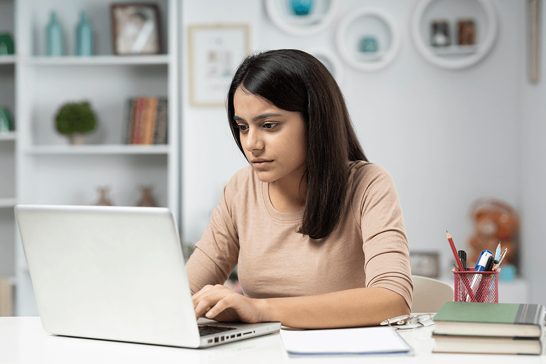 Woman concentrating at a laptop